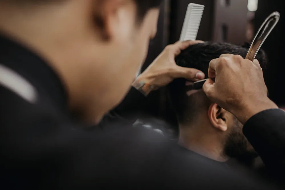 Barber detailing with a straight razor